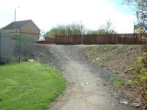 The point where the cycle route is crossed by a new housing estate road - the path is now shut here!